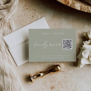 May include: A sage green wedding RSVP card with the names "Emmy + Archer" and a QR code. The card also includes the text "kindly RSVP" and "DY 07.11 XX". A white envelope and a gold wax seal are also visible.