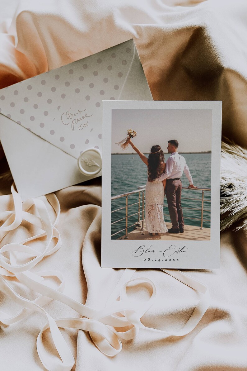 May include: A wedding invitation with a photo of a couple on a boat, with the names "Blair + Easton" and the date "08.24.20XX" in elegant script. An envelope with polka dots and the text "Citrus Press Co." is also visible.