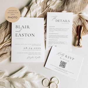May include: Elegant wedding invitation suite featuring white cards with black text. The main invitation card displays the names "Blair and Easton" and wedding details. Includes RSVP and details cards, a wax seal, and a gold-colored stamp.