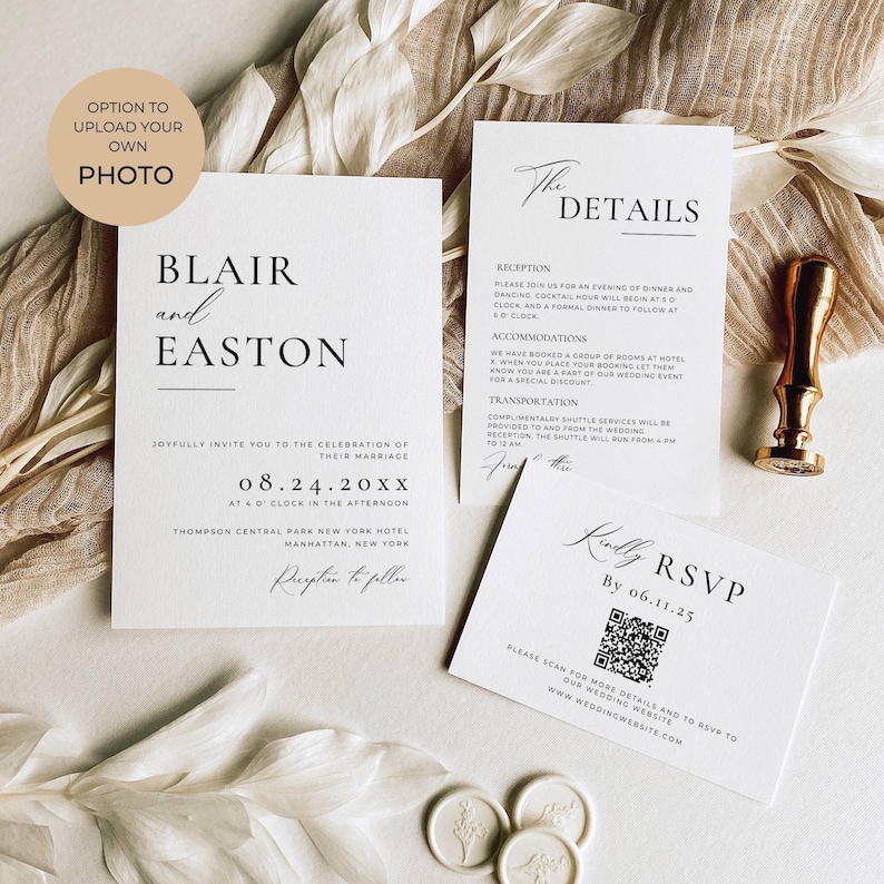 May include: Elegant wedding invitation suite featuring white cards with black text. The main invitation card displays the names "Blair and Easton" and wedding details. Includes RSVP and details cards, a wax seal, and a gold-colored stamp.