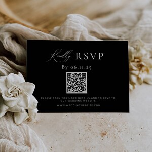 May include: Black and white RSVP card with a QR code. The text reads "Kindly RSVP by 06.11.25" and "Please scan for more details and to RSVP to our wedding website www.weddingwebsite.com".