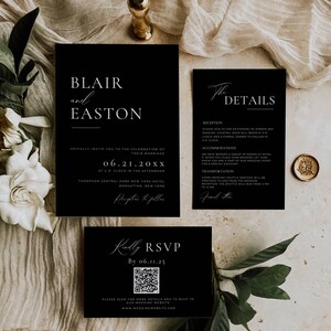 May include: Black and white wedding invitation suite with a modern design. The invitation features the names "Blair and Easton" and the date "06.21.20XX". The details card includes information about the reception, accommodations, and transportation. A separate RSVP card features a QR code and the text "Kindly RSVP by 06.11.25".