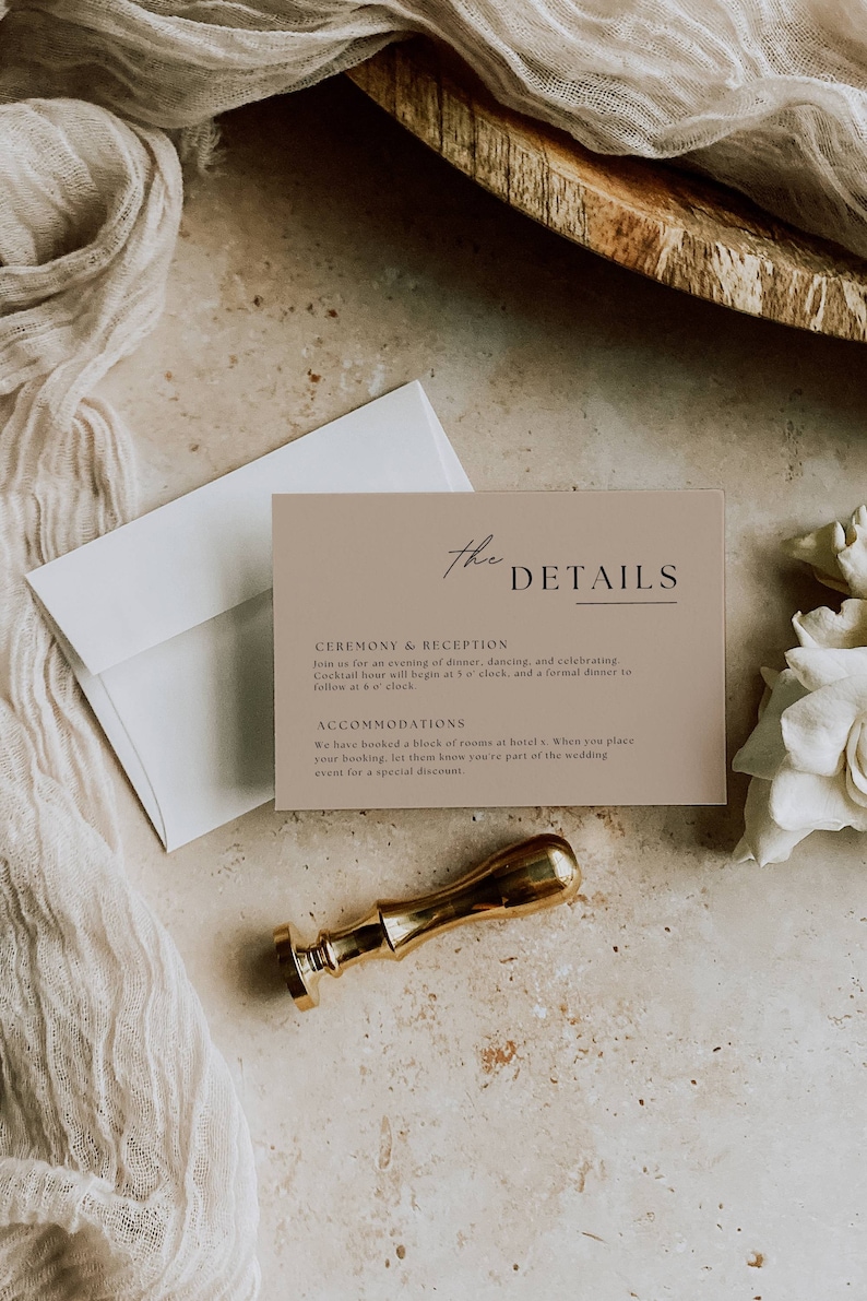 May include: A light brown card with the text "The Details" in black script font. The card provides information about a wedding ceremony and reception, including the time of the cocktail hour and dinner, as well as details about accommodations at a hotel.