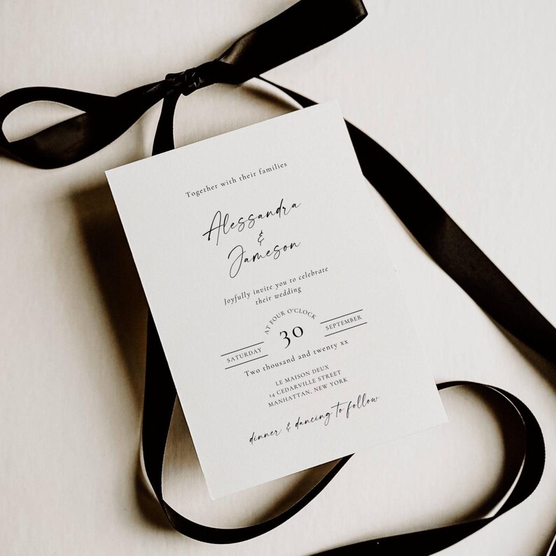 May include: A white wedding invitation with black script and a black ribbon. The invitation reads "Alessandra & Jameson" and includes the date "September 30". The text "dinner & dancing to follow" is also included.