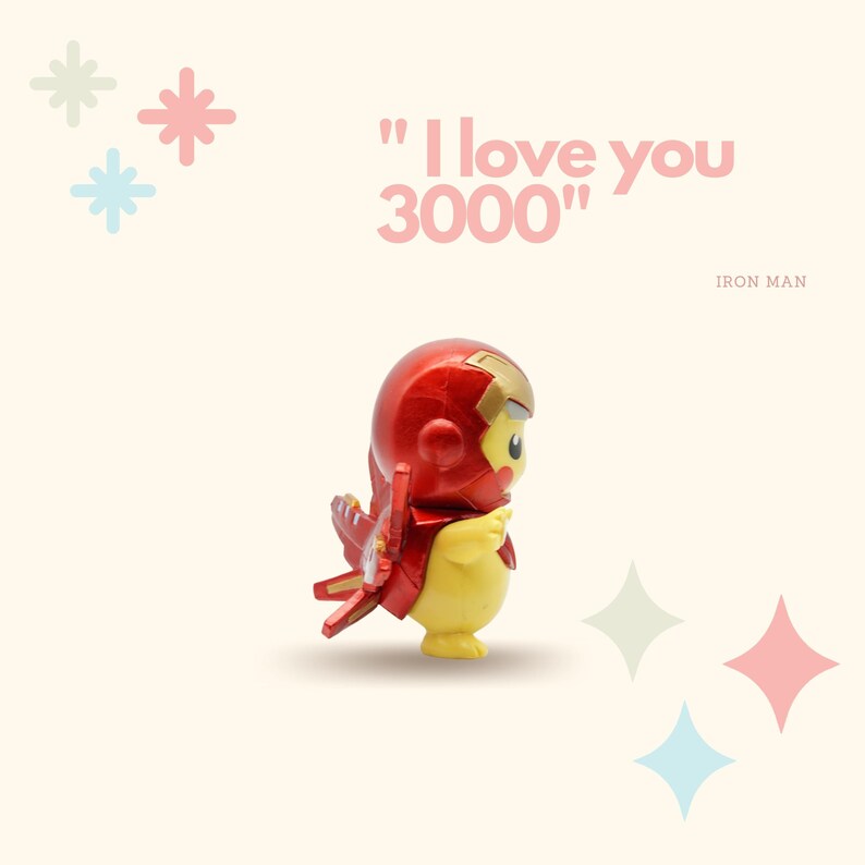 May include: A yellow Pikachu figurine wearing a red and gold Iron Man suit. The figurine is standing on a white background with the text "I love you 3000" and "IRON MAN" written below.