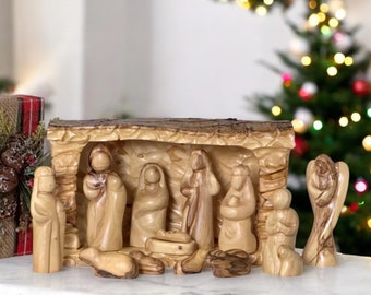 Olive wood nativity cave scene, olive wood nativity set, hand carved nativity scene with Angel, hand made in the Holy Land