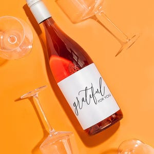 a bottle of wine sitting on top of a table