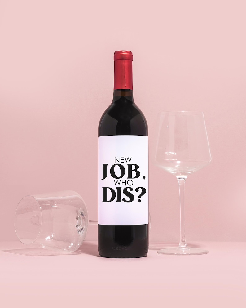 a bottle of wine next to a wine glass