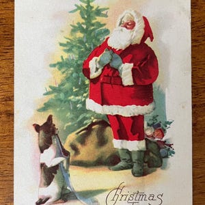 EXC Rare Vintage Christmas Joys Postcard Puppy Dog w/ Stocking Begging to Santa Claus Untextured Antique Unwritten Unsent 281
