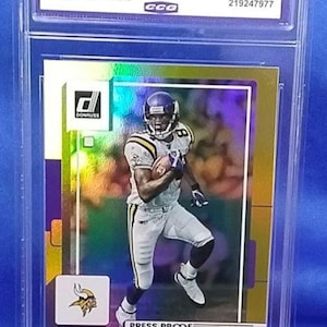 Randy Moss 2022 Panini Donruss #111 Press Proof Gold (Mint+ 9.5)