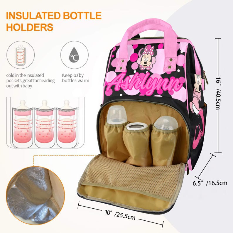 May include: Black and pink insulated baby bottle holder backpack with a Minnie Mouse design. The bag has a pink handle and the name "Ashlynn" in pink. It measures 16 inches (40.5 cm) high, 10 inches (25.5 cm) wide, and 6.5 inches (16.5 cm) deep.