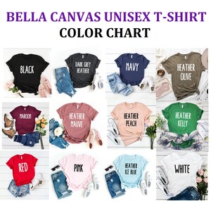 May include: Color chart showing different colors of Bella Canvas unisex t-shirts. The colors include black, dark grey heather, navy, heather olive, maroon, heather mauve, heather peach, heather kelly, red, pink, heather ice blue, and white.