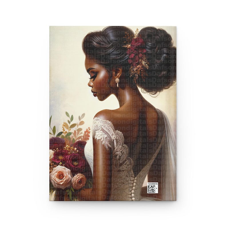 May include: A bride with dark skin and a white lace dress holds a bouquet of burgundy and peach roses. Her hair is styled in a bun with a burgundy flower.