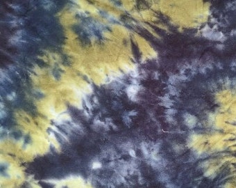 Tie Dyed French Terry Fabric.  Available in multiple colors.  Sold in one-yard cuts.