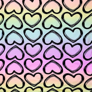 May include: A rainbow ombre fabric with a repeating pattern of black outlined hearts.