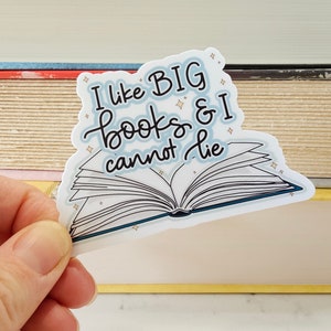 May include: A white sticker with a blue book design and the text "I like BIG books & I cannot lie".