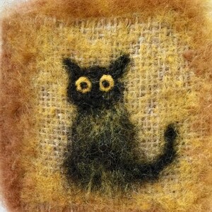 Adorabile quadrato di gatto coccoloso, carta infeltrita ad ago
