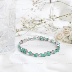 Emerald Tennis Bracelet: Oval Cut Gemstone, 925 Sterling Silver