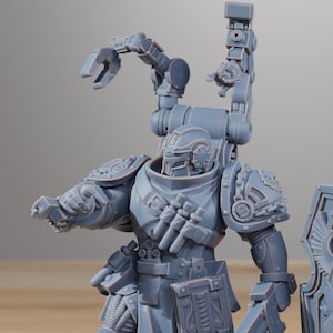 May include: A gray, detailed figurine of a futuristic soldier with a helmet, armor, and mechanical arm attachments. The figurine is standing on a base. The word "STATION" is at the top.
