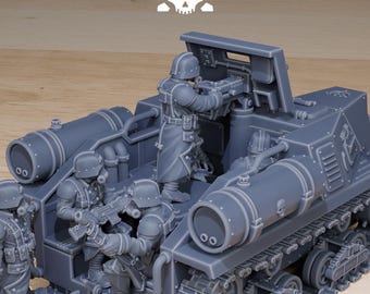May include: A gray plastic model of a tracked armored vehicle with a crew of five soldiers. The vehicle has two large cannons on the front and a smaller cannon on the back. The soldiers are holding rifles and are wearing helmets and armor.