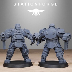 May include: Two gray plastic miniature figures of a person wearing futuristic armor and holding a weapon. The figures are standing on round bases.