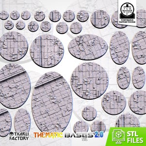 May include: A collection of light gray miniature bases in various circular and oval sizes, featuring a textured urban tile floor pattern with debris. The image includes a logo for The Custom Bit and text reading Thematic Bases 2.0 STL Files.