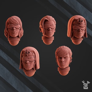 May include: Five terracotta-colored miniature busts of people with blindfolds. Each bust has a different hairstyle and facial expression. The busts are all facing forward and are set against a gray and white striped background.