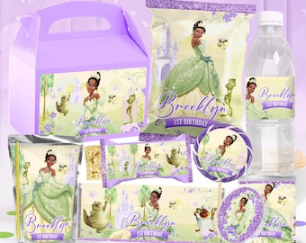 May include: A set of party favor bags and boxes featuring a princess character with green and purple accents. The bags and boxes are decorated with a castle, frogs, and butterflies. The text "Brooklyn 1st Birthday" is printed on each item.