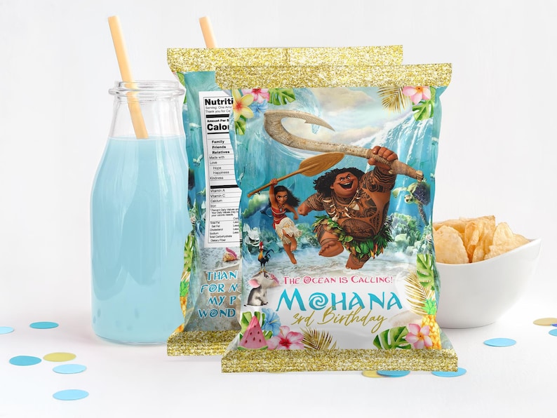 May include: A colourful party favour bag with a Moana theme. The bag features a cartoon image of Maui, a Polynesian demigod, holding a fish hook. The bag also has the text "The Ocean is Calling! Moana 3rd Birthday".