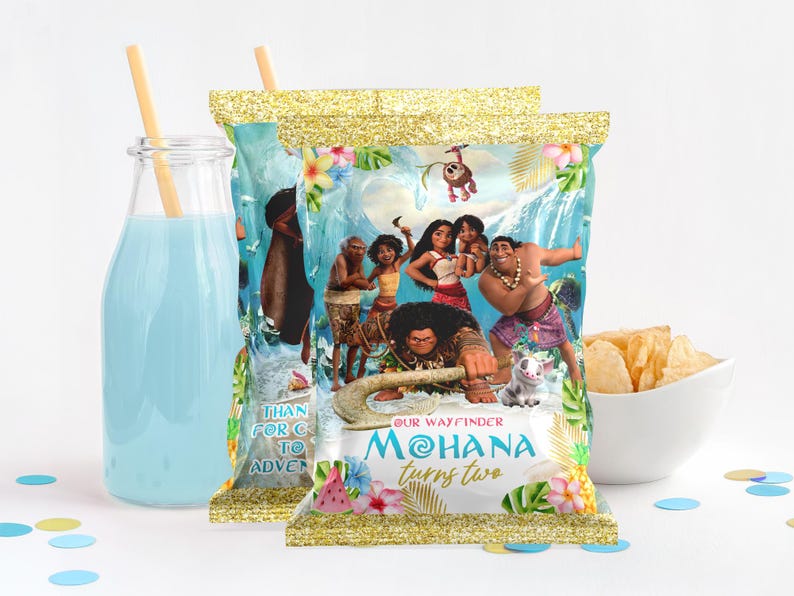 May include: A colorful chip bag featuring characters from the animated film Moana. The bag has a gold glitter background with a blue and green tropical design. The text on the bag reads "Our Wayfinder Moana turns two".