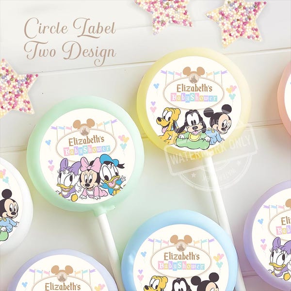 May include: Round lollipops in pastel colors featuring Disney baby character graphics and the text Elizabeth's Baby Shower. The labels include illustrations of baby Mickey, Minnie, Pluto, Goofy, Donald, and Daisy Duck with colorful bunting flags.