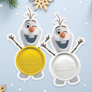 May include: Two white Olaf character cutouts from the film Frozen, each featuring a winking expression, stick arms, and a carrot nose. One cutout has a yellow circular Play-Doh lid attached, and the other has a white circular Play-Doh lid attached.