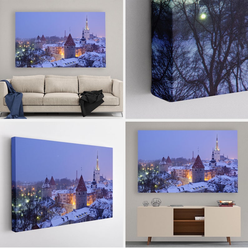 May include: A panoramic view of a city skyline at dusk, with snow-covered rooftops and tall buildings. The city is lit up with lights, and the sky is a soft blue.