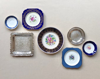 Gallery wall plates. Mismatched dishes. Cobalt blue shades. Instant wall decor