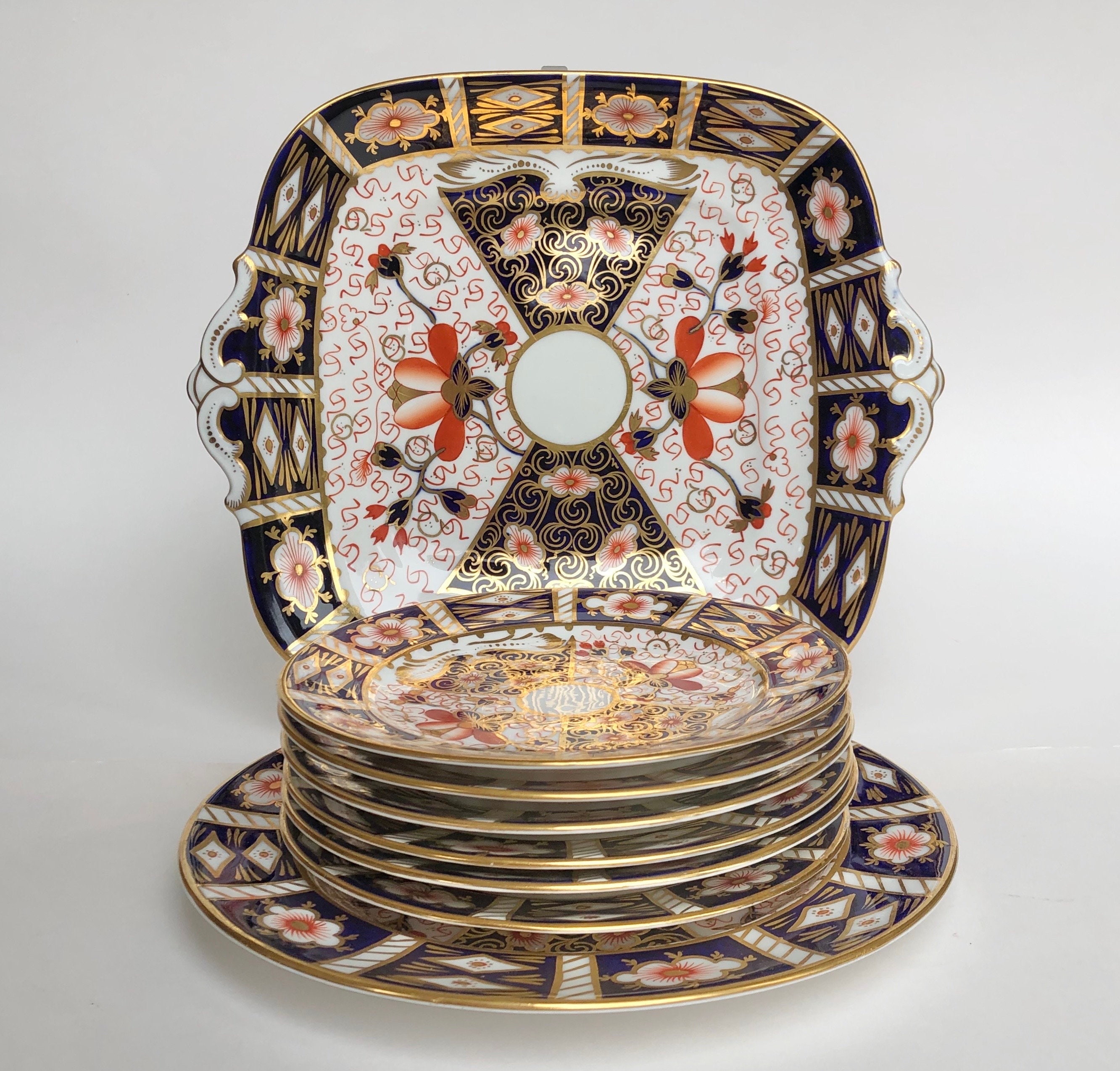 Antique Royal Crown Derby set of plates. Rare. Traditional Imari pattern from England. Side plates, salad plate, cake plate
