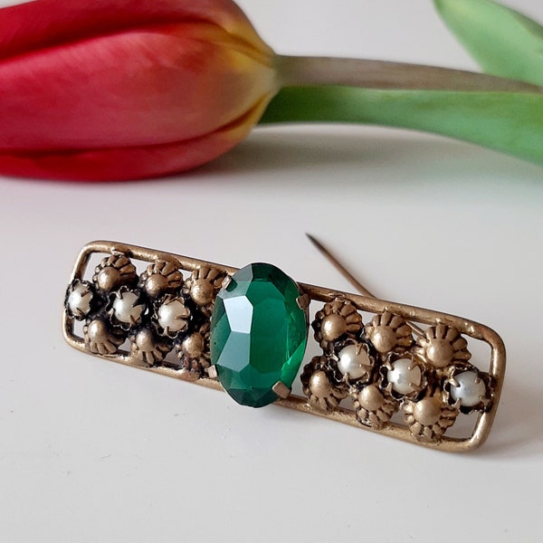 Antique brooch, Czechoslovakia, 30s. The brooch is made of brass, decorated with a large emerald chaton and pearls
