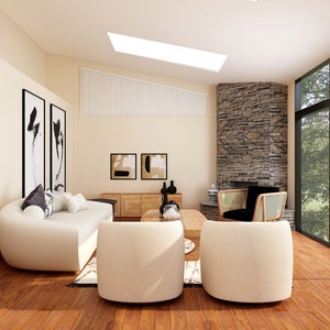 May include: A living room featuring a white curved sofa, two white armchairs, a coffee table, and a stone fireplace. The room has large windows with a view of trees outside.
