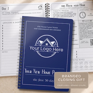 May include: A dark blue spiral-bound planner titled Your New Home Plan the first 30 days, featuring a white house icon and logo space. It rests on an open planner page with sections for home moments, daily missions, and unpacking checklists.