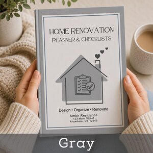 May include: A gray home renovation planner and checklist book. The cover features a house graphic with a checklist and hearts. Text includes "Home Renovation Planner & Checklists" and "Design, Organize, Renovate."