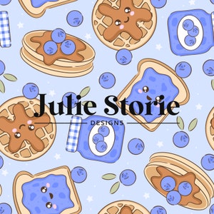 Puede incluir: Un patrón sin costuras con lindas ilustraciones de dibujos animados de waffles, tostadas y mermelada de arándanos. El patrón está sobre un fondo azul claro con estrellas blancas y arándanos. El texto "Julie Storie DESIGNS" está en el centro del patrón.