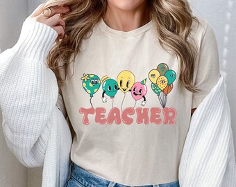 Volver a la camiseta del maestro de la escuela regalo de apreciación del maestro graduación estudiante maestro escuela primaria grados primarios música matemáticas retro maravilloso