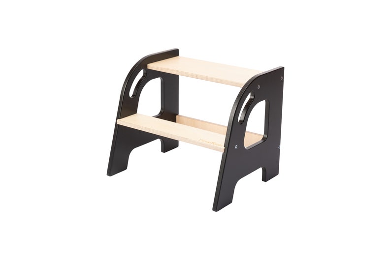 Black two step step stool made out of plywood. Color black and wood.Holds up to 130kg made by DeveKids model KLEC