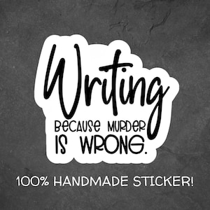 Puede incluir: Una pegatina blanca con texto negro que dice "Writing because murder is wrong". La pegatina también dice "100% Handmade Sticker!" en una fuente más pequeña. La pegatina está sobre un fondo texturizado gris oscuro.
