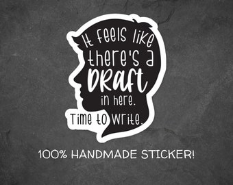 Può includere: Adesivo bianco e nero con la silhouette di una testa e il testo "It feels like there's a draft in here. Time to write."  100% HANDMADE STICKER!
