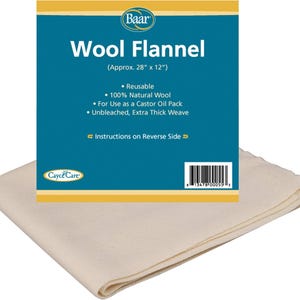 May include: A folded piece of unbleached, extra thick weave 100% natural wool flannel fabric. The packaging label reads Baar Wool Flannel, Approx. 28" x 12", Reusable, 100% Natural Wool, For Use as a Castor Oil Pack, and Instructions on Reverse Side.