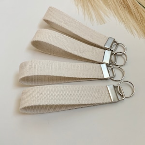 Llavero de lona Pulsera de lona de algodón en blanco Llavero en blanco Suministros Pulsera Llavero Llavero de vinilo de transferencia de calor en blanco Etiqueta de mochila en blanco