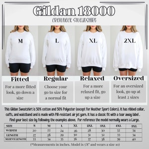 May include: A size chart for Gildan 18000 crewneck sweatshirts. The chart shows the different sizes available, from S to 5XL, and the corresponding measurements in inches for width, length, and sleeve length. The chart also includes a description of the fit for each size: fitted, regular, relaxed, and oversized.