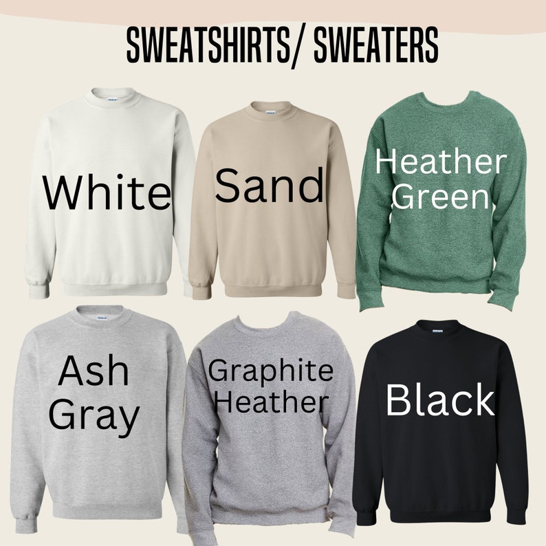 May include: Six different color sweatshirts or sweaters. The colors are white, sand, heather green, ash gray, graphite heather, and black.