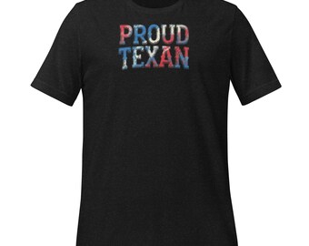 May include: A black t-shirt with the words "PROUD TEXAN" printed in a distressed, patriotic design. The text features red, white, and blue colors, evoking the Texas flag. The shirt is short-sleeved and made of a soft material.