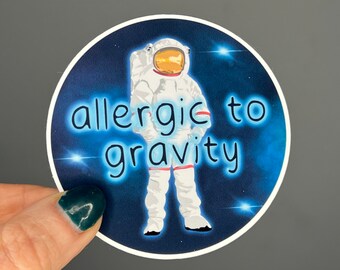 Waterproof vinyl sticker. Astronaut, allergic to gravity, PoTS, postural orthostatic tachycardia syndrome, dysautonomia, funny, humour.